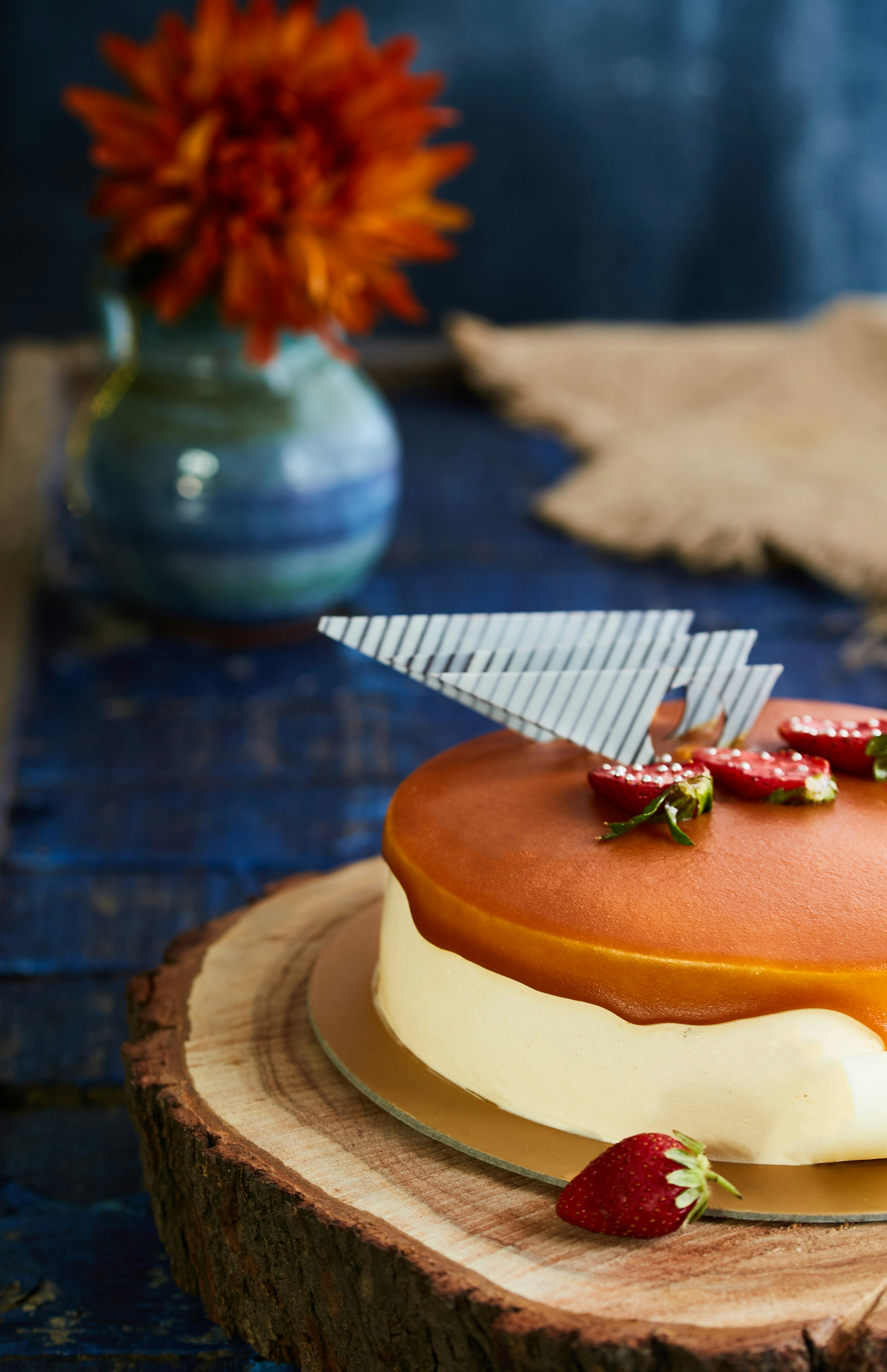 baked cake with strawberry top